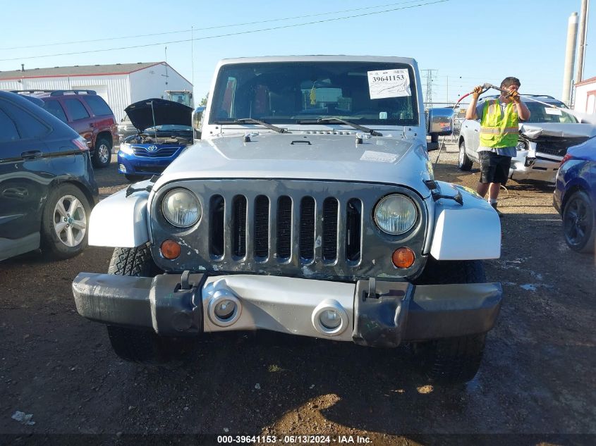 2010 Jeep Wrangler Unlimited Sahara VIN: 1J4BA5H14AL148811 Lot: 39641153