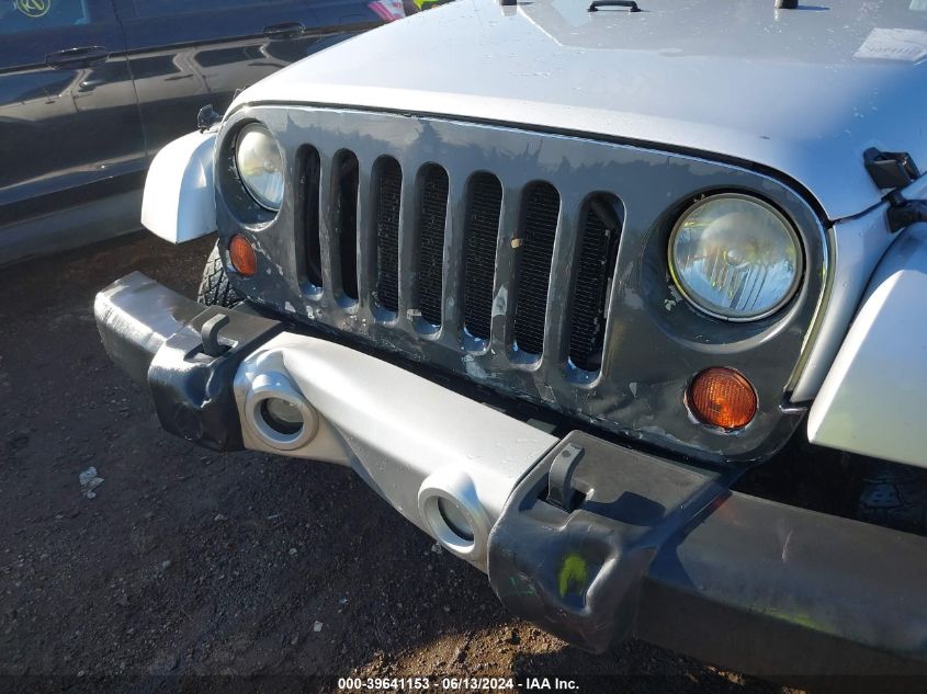 2010 Jeep Wrangler Unlimited Sahara VIN: 1J4BA5H14AL148811 Lot: 39641153