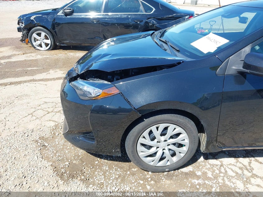 2017 Toyota Corolla Le VIN: 5YFBURHEXHP627050 Lot: 39642082