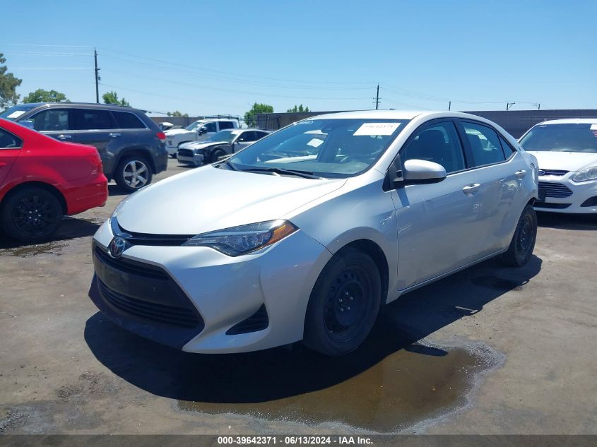 2018 Toyota Corolla Le VIN: 2T1BURHE5JC011231 Lot: 39642371