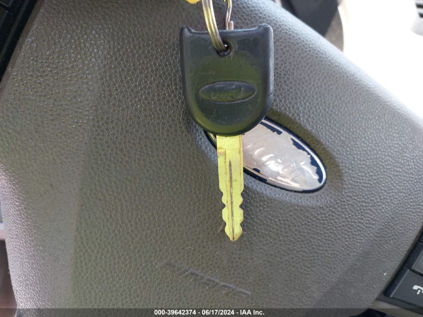 2009 Ford Focus Se VIN: 1FAHP35N19W250318 Lot: 39642374