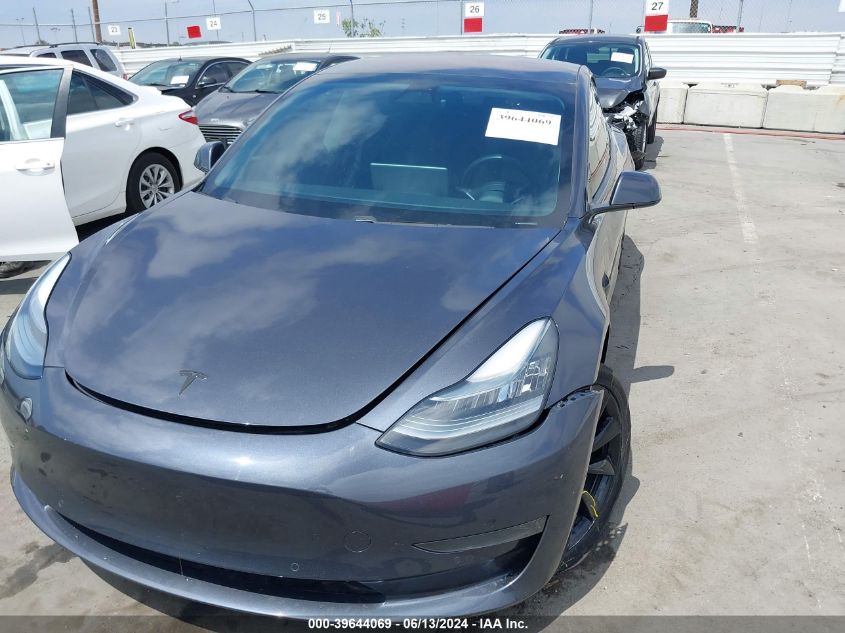 2018 Tesla Model 3 Long Range/Mid Range VIN: 5YJ3E1EA0JF009533 Lot: 39644069