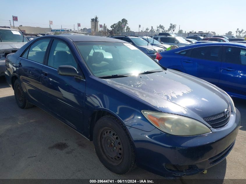 2003 Toyota Camry Le VIN: JTDBE32KX30154746 Lot: 39644741