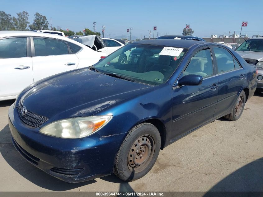 2003 Toyota Camry Le VIN: JTDBE32KX30154746 Lot: 39644741