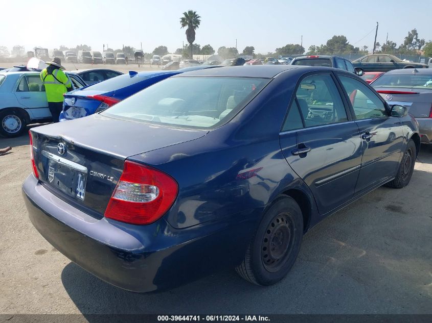 2003 Toyota Camry Le VIN: JTDBE32KX30154746 Lot: 39644741