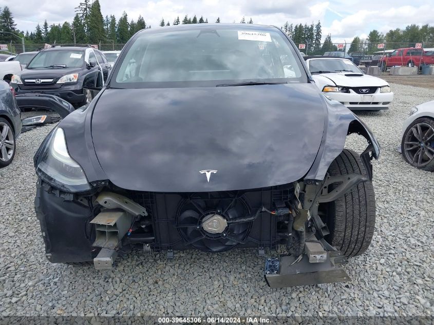 2023 Tesla Model Y Awd/Long Range Dual Motor All-Wheel Drive VIN: 7SAYGDEE1PF607811 Lot: 39645306