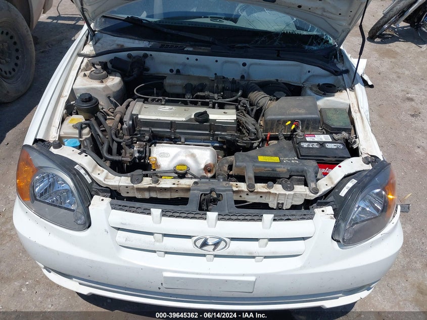 2005 Hyundai Accent Gls/Gt VIN: KMHCG35C55U350765 Lot: 39645362