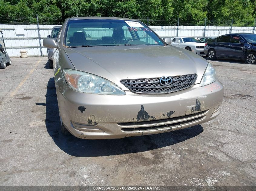 2004 Toyota Camry Le VIN: JTDBE32K240272176 Lot: 39647283