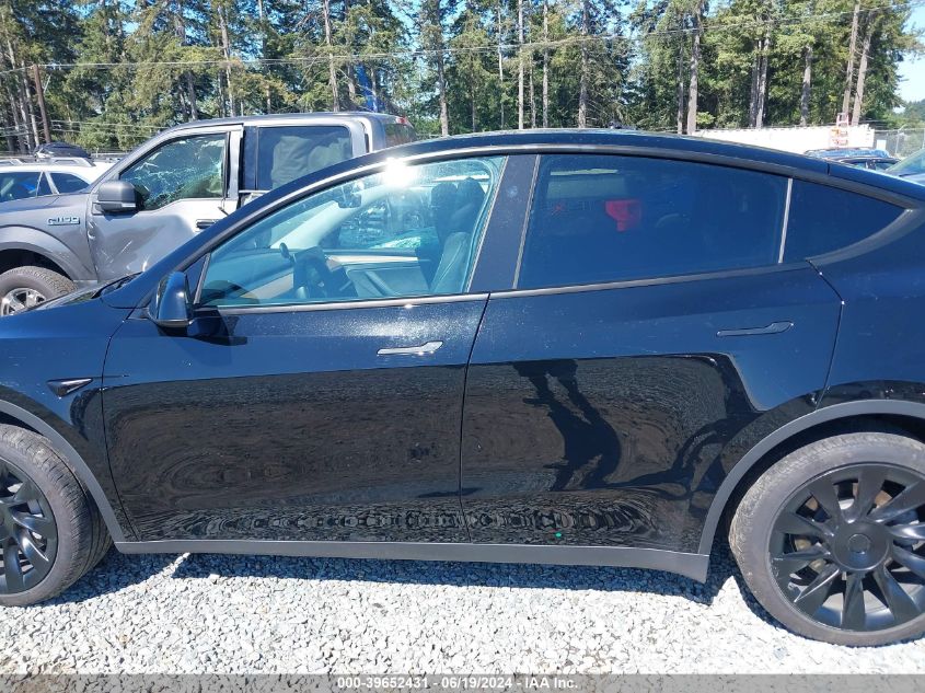 2023 Tesla Model Y Awd/Long Range Dual Motor All-Wheel Drive VIN: 7SAYGAEEXPF799616 Lot: 39652431