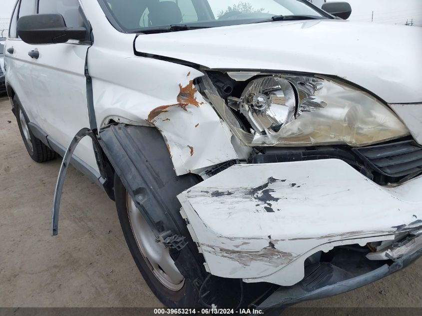 2007 Honda Cr-V Lx VIN: JHLRE38347C058312 Lot: 39653214