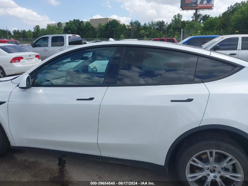 2023 Tesla Model Y Awd/Long Range Dual Motor All-Wheel Drive VIN: 7SAYGDEE1PF766926 Lot: 39654545