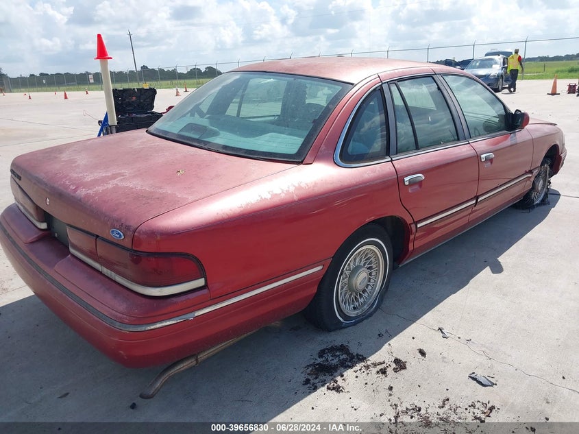 1996 Ford Crown Victoria Lx VIN: 2FALP7467TX106831 Lot: 39656830