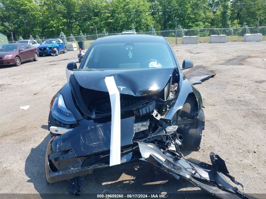 2022 Tesla Model 3 Long Range Dual Motor All-Wheel Drive VIN: 5YJ3E1EB0NF322306 Lot: 39659260