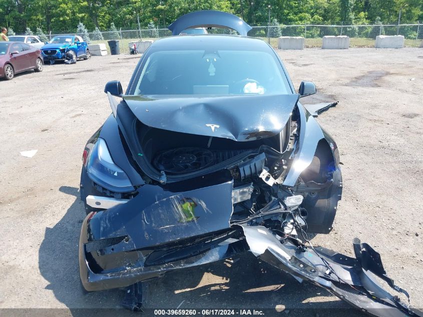 2022 Tesla Model 3 Long Range Dual Motor All-Wheel Drive VIN: 5YJ3E1EB0NF322306 Lot: 39659260