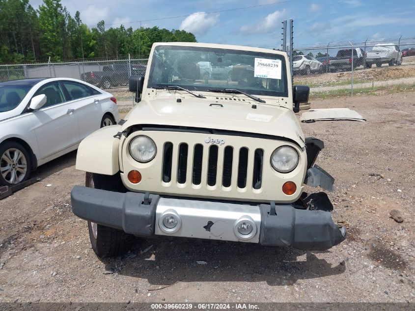 2011 Jeep Wrangler Unlimited Sahara VIN: 1J4HA5H18BL561570 Lot: 39660239