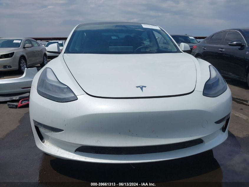 2021 Tesla Model 3 Standard Range Plus Rear-Wheel Drive VIN: 5YJ3E1EA7MF922648 Lot: 39661313