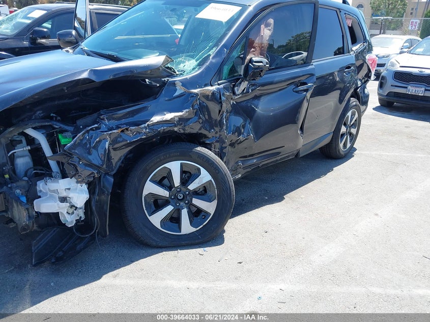 2018 Subaru Forester 2.5I Premium VIN: JF2SJAGC0JH594010 Lot: 39664033