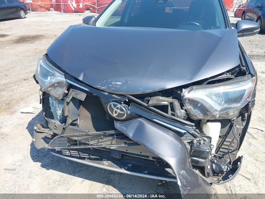 2018 TOYOTA RAV4 XLE - JTMWFREVXJJ747392