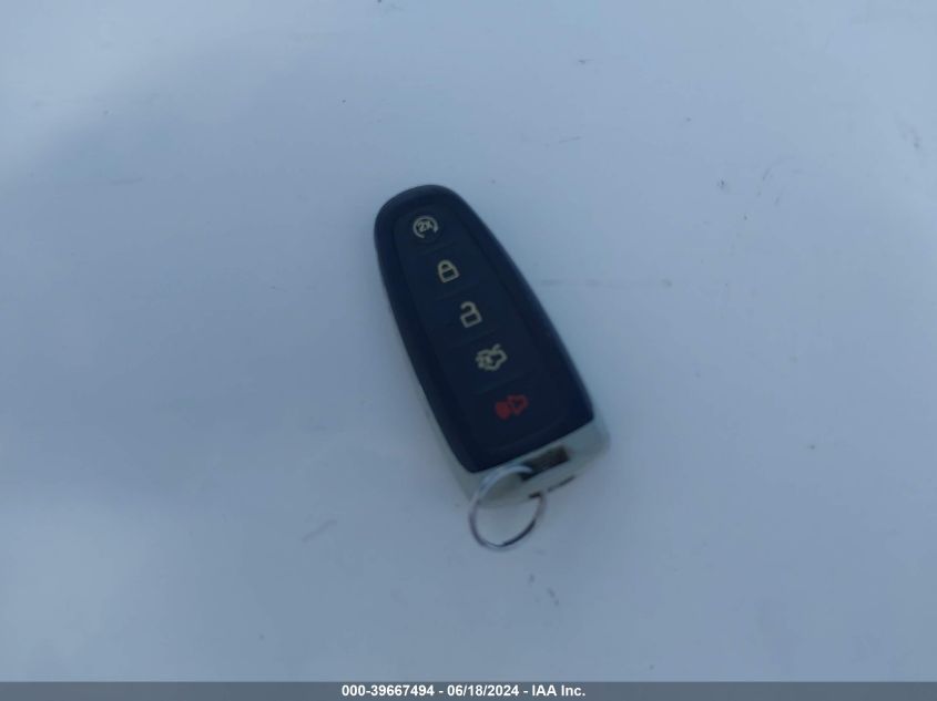 2014 Ford Focus Titanium VIN: 1FADP3N21EL207842 Lot: 39667494