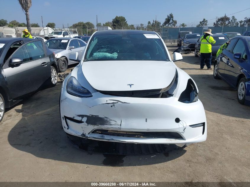 2023 Tesla Model Y Awd/Long Range Dual Motor All-Wheel Drive VIN: 7SAYGDEE3PA067942 Lot: 39668288