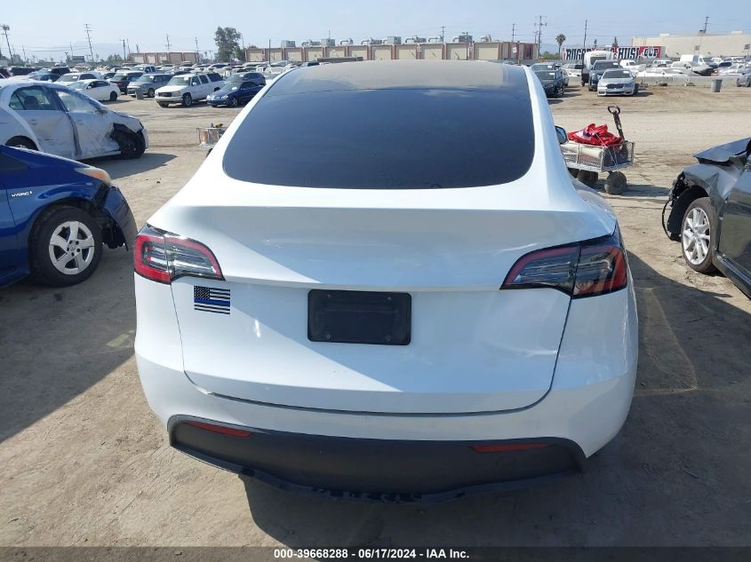 2023 Tesla Model Y Awd/Long Range Dual Motor All-Wheel Drive VIN: 7SAYGDEE3PA067942 Lot: 39668288