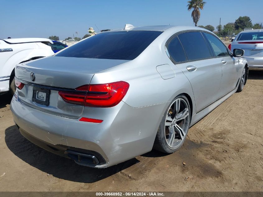 2018 BMW 740I VIN: WBA7E2C52JB216292 Lot: 39668952