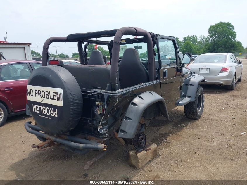 2000 Jeep Wrangler Sport VIN: 1J4FA49S6YT729233 Lot: 39669114