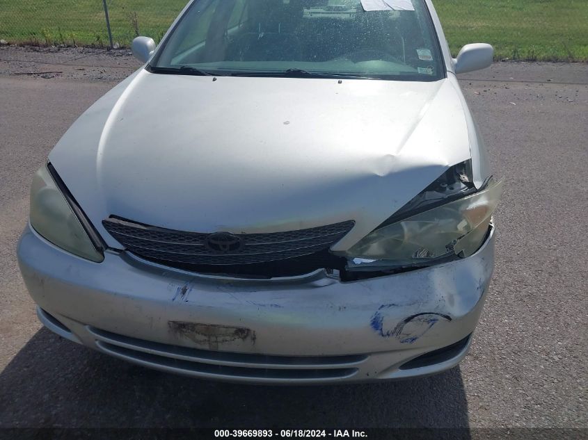 2004 Toyota Camry Le VIN: 4T1BE32K34U936764 Lot: 39669893