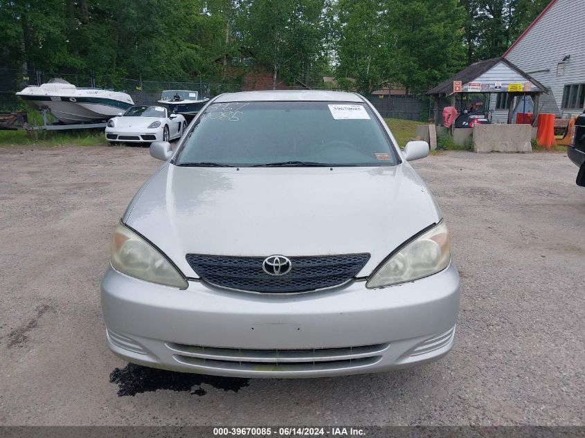 2003 Toyota Camry Le VIN: 4T1BE32KX3U700580 Lot: 39670085