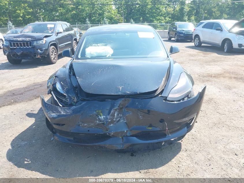 2022 Tesla Model 3 Long Range Dual Motor All-Wheel Drive VIN: 5YJ3E1EB9NF182126 Lot: 39670379