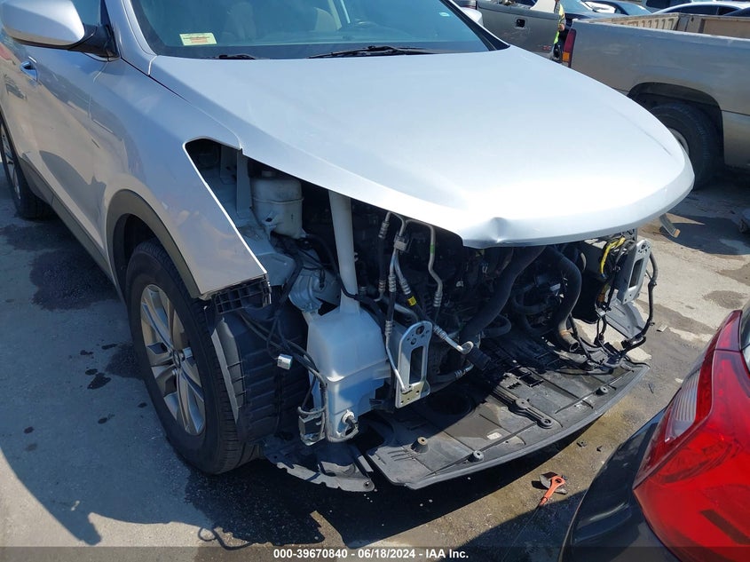 2016 Hyundai Santa Fe Sport 2.4L VIN: 5XYZTDLBXGG323446 Lot: 39670840