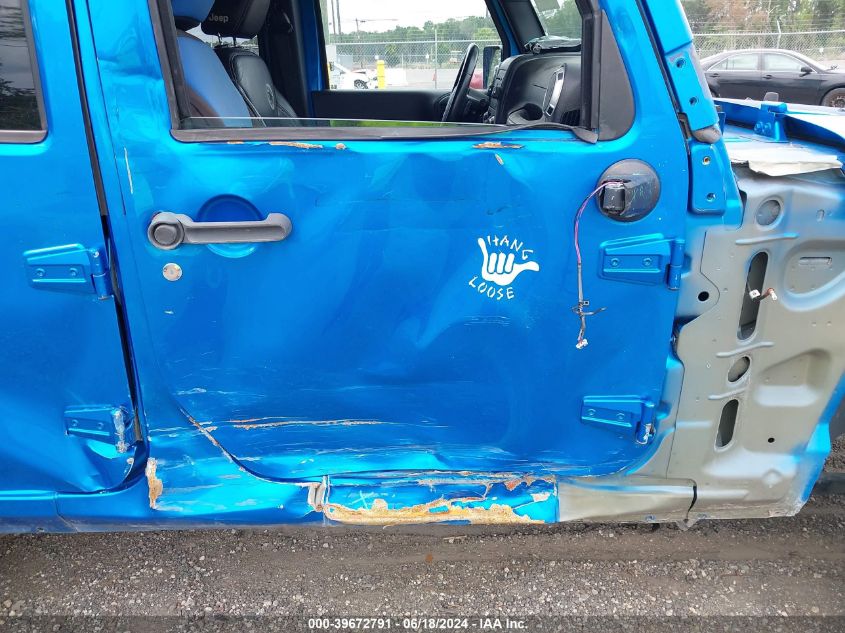 2014 Jeep Wrangler Unlimited Freedom Edition VIN: 1C4BJWDG5EL161109 Lot: 39672791