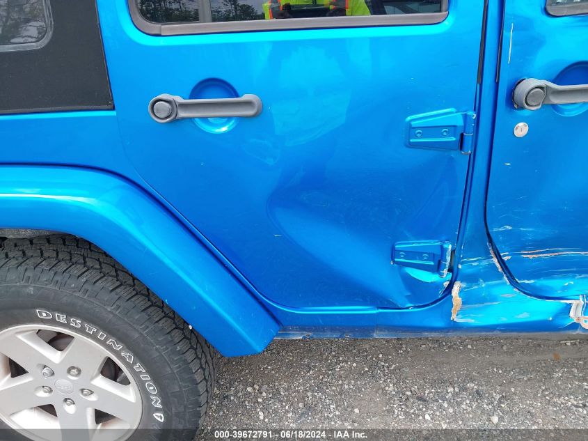 2014 Jeep Wrangler Unlimited Freedom Edition VIN: 1C4BJWDG5EL161109 Lot: 39672791