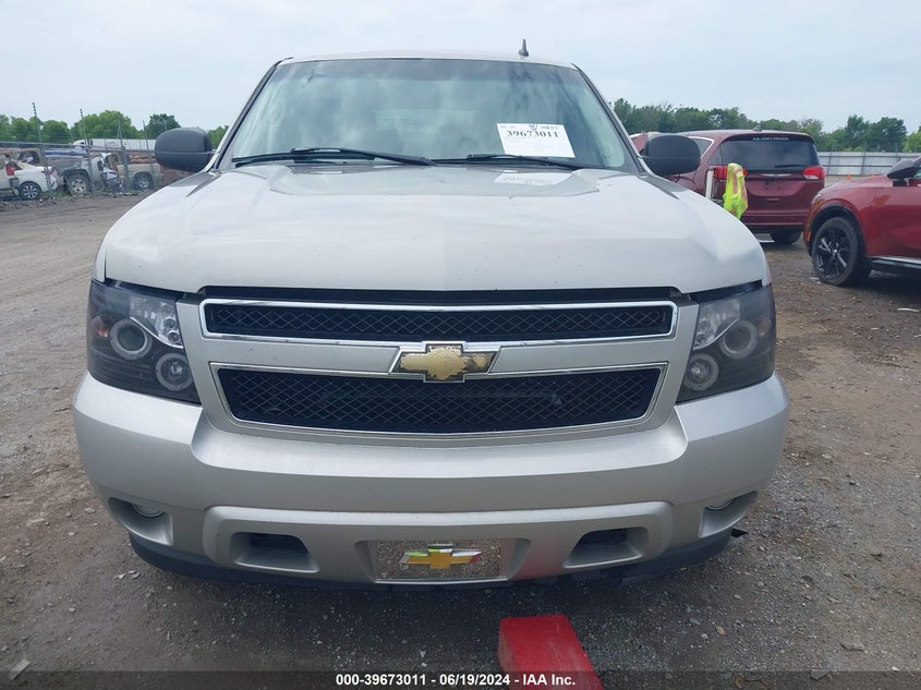 2007 Chevrolet Tahoe Ls VIN: 1GNFC13C47J404203 Lot: 39673011