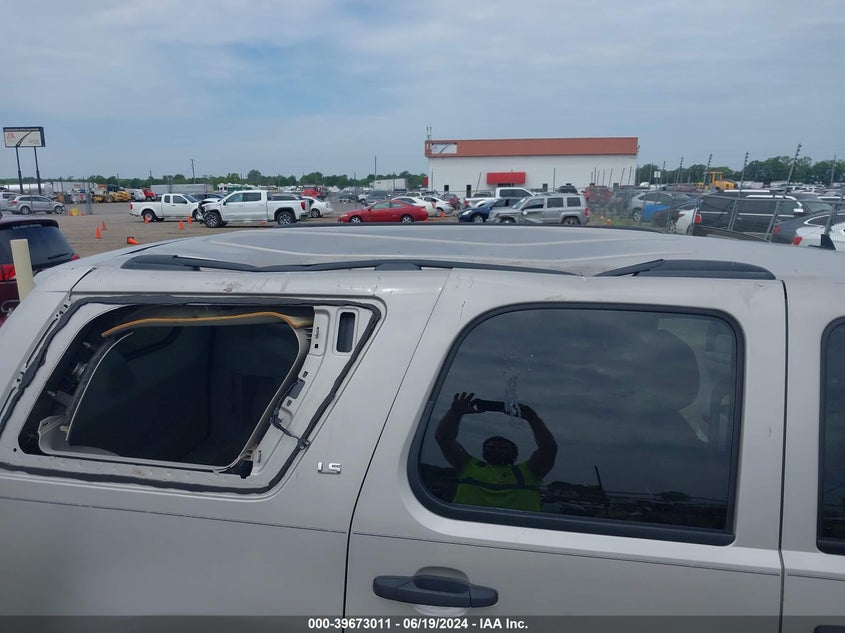 2007 Chevrolet Tahoe Ls VIN: 1GNFC13C47J404203 Lot: 39673011