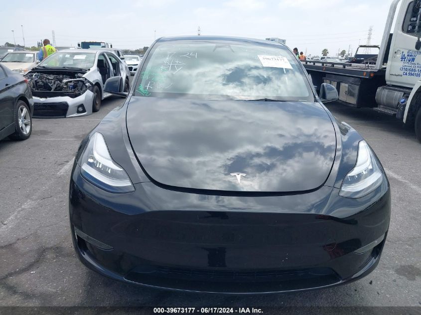 2023 Tesla Model Y Awd/Long Range Dual Motor All-Wheel Drive VIN: 7SAYGDEE8PA044236 Lot: 39673177