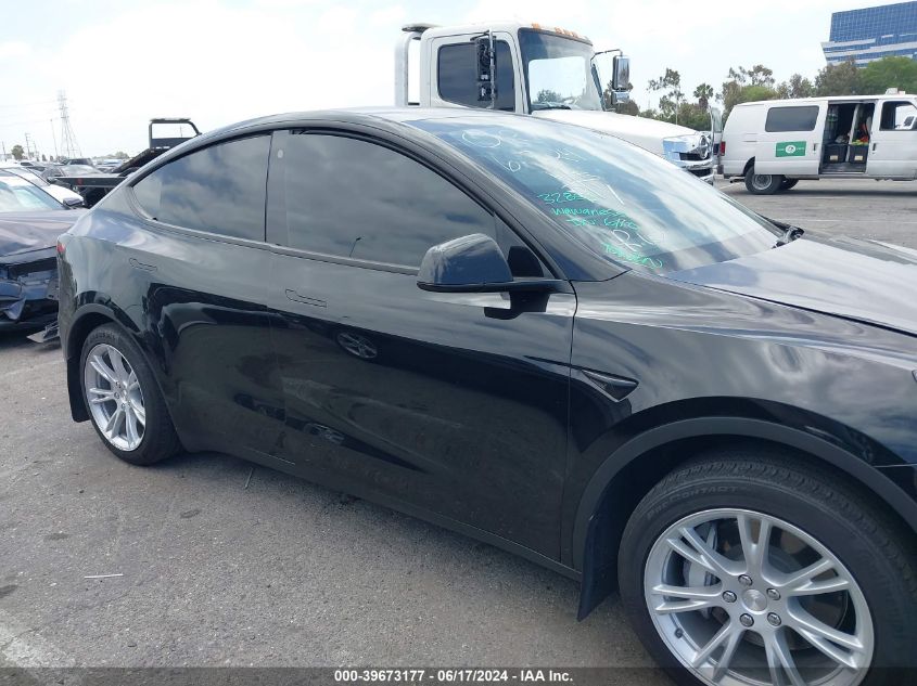 2023 Tesla Model Y Awd/Long Range Dual Motor All-Wheel Drive VIN: 7SAYGDEE8PA044236 Lot: 39673177