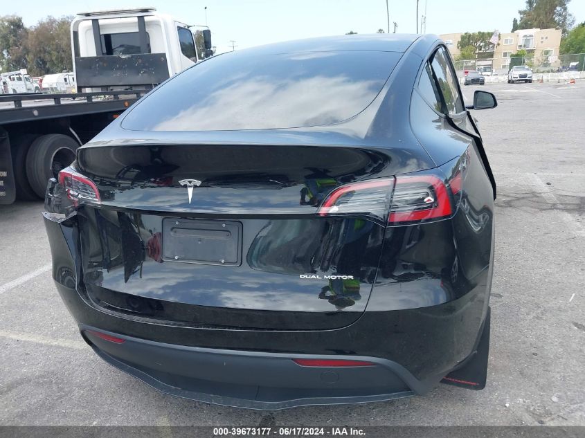 2023 Tesla Model Y Awd/Long Range Dual Motor All-Wheel Drive VIN: 7SAYGDEE8PA044236 Lot: 39673177