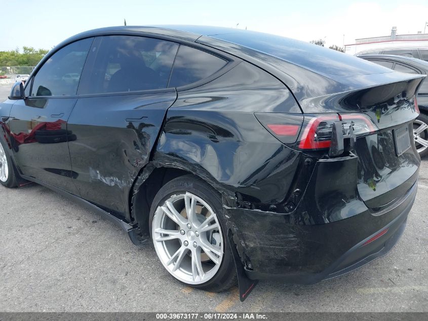 2023 Tesla Model Y Awd/Long Range Dual Motor All-Wheel Drive VIN: 7SAYGDEE8PA044236 Lot: 39673177