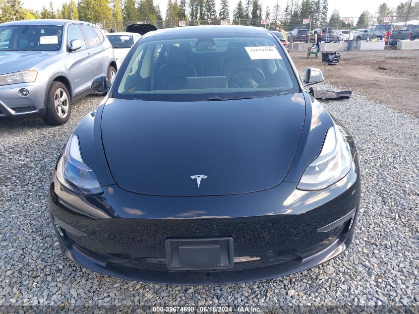 2021 Tesla Model 3 Standard Range Plus Rear-Wheel Drive VIN: 5YJ3E1EA7MF988858 Lot: 39674698