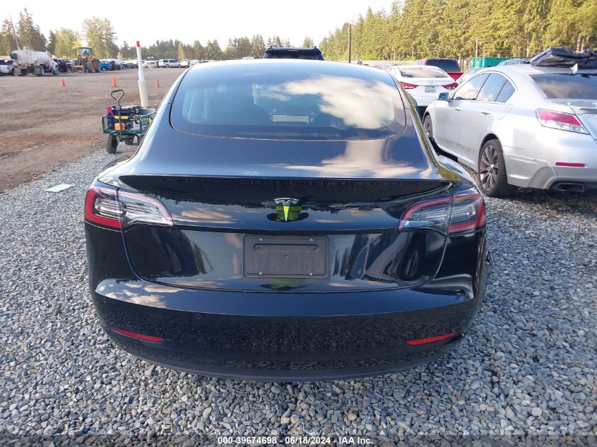 2021 Tesla Model 3 Standard Range Plus Rear-Wheel Drive VIN: 5YJ3E1EA7MF988858 Lot: 39674698