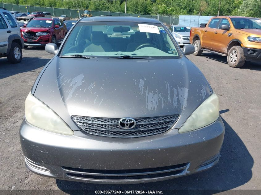 2003 Toyota Camry Le VIN: 4T1BE32KX3U670822 Lot: 39677249