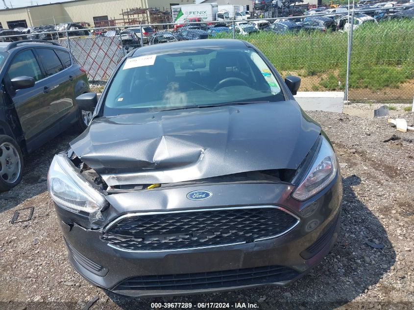 2018 Ford Focus S VIN: 1FADP3E21JL268599 Lot: 39677289