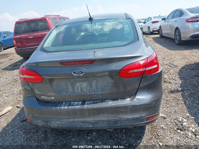 2018 Ford Focus S VIN: 1FADP3E21JL268599 Lot: 39677289