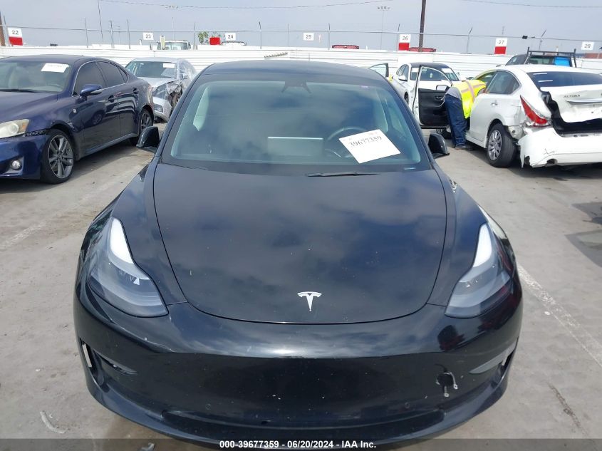 2022 Tesla Model 3 Rear-Wheel Drive VIN: 5YJ3E1EA7NF107934 Lot: 39677359