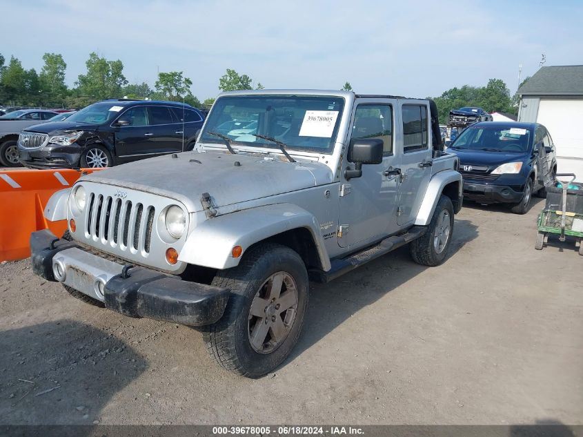 2008 Jeep Wrangler Unlimited Sahara VIN: 1J4GA591X8L553621 Lot: 39678005