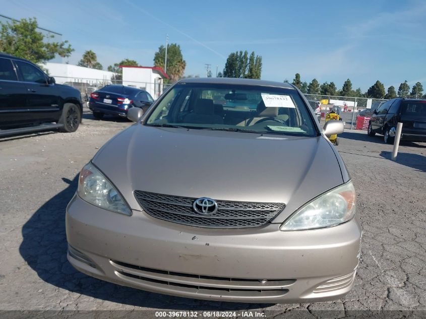 2003 Toyota Camry Le V6 VIN: 4T1BF30K03U558658 Lot: 39678132