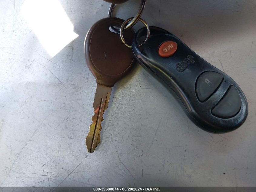 2001 Jeep Grand Cherokee VIN: 1J4GW485212619123 Lot: 39680074