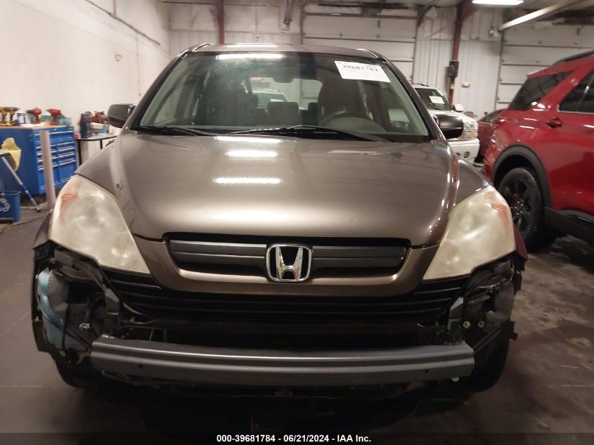 2009 Honda Cr-V Lx VIN: 3CZRE38329G704812 Lot: 39681784