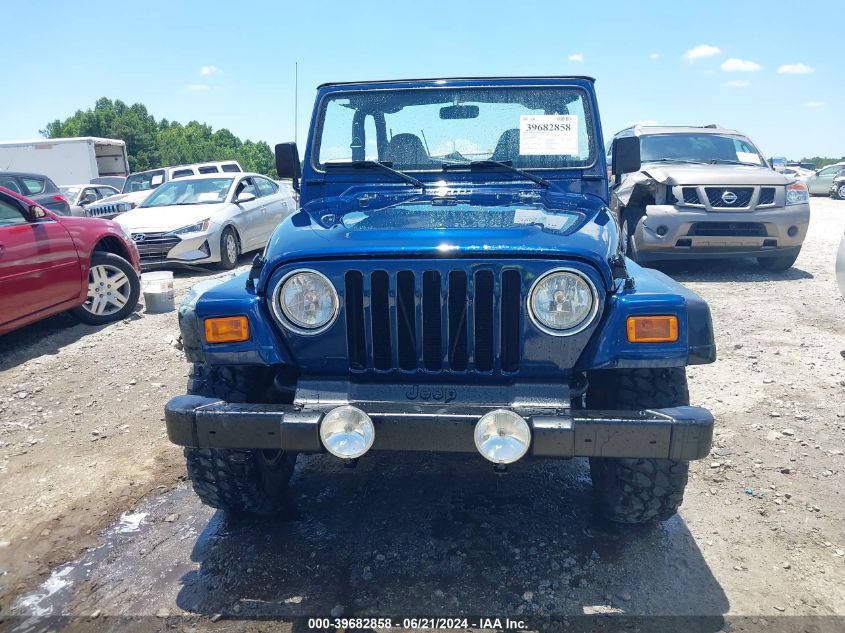 2000 Jeep Wrangler Se VIN: 1J4FA29P6YP765813 Lot: 39682858